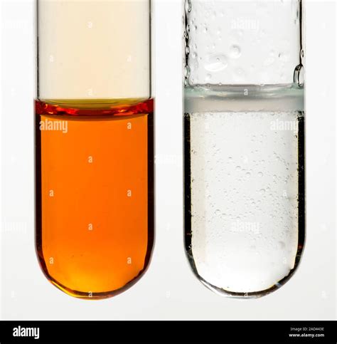 drops of bromine solution to test presence of alkene bones|alkyl bromide test tube.